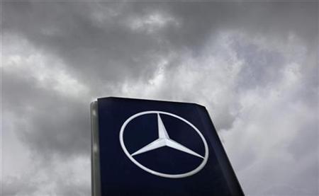 German car manufacturer Daimler's characteristic Mercedes-Benz star is seen outside a Mercedes dealership.