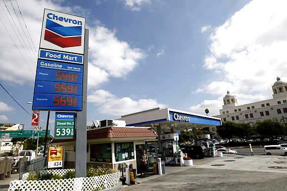 Gas prices are displayed at a Chevron gas station in Los Angeles, California.