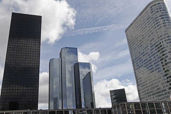 A view of Total building named Total Coupole Tower, centre, at the La Defense business district in Courbevoie near Paris.