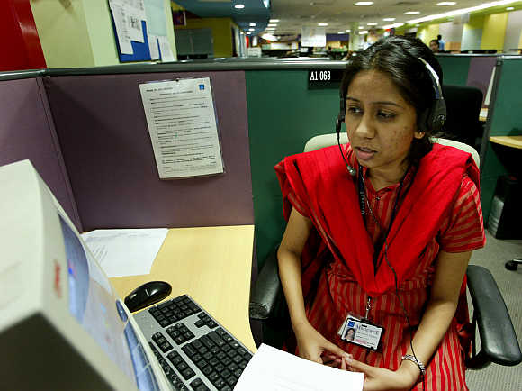 Some companies throw common-sense service norms out of the window. A call centre in Bangalore.