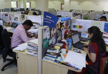 Employees of TCS work inside the company headquarters in Mumbai.