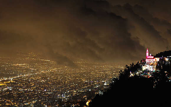 A view of illuminated decorations at Monserrate church in Bogota, Colombia.