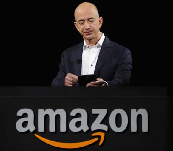 Amazon CEO Jeff Bezos demonstrates the Kindle Paperwhite.