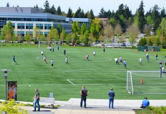 Employees enjoy a game of soccer on the Microsoft Redmond Campus.