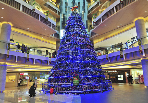 A novelty Christmas tree made of bicycles stands in a shopping mall in Shenyang, China