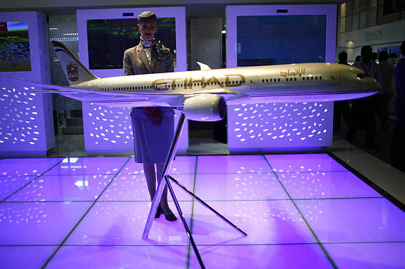 A model of an Etihad airline plane is displayed during the opening of the Arabian Travel Market show in Dubai.