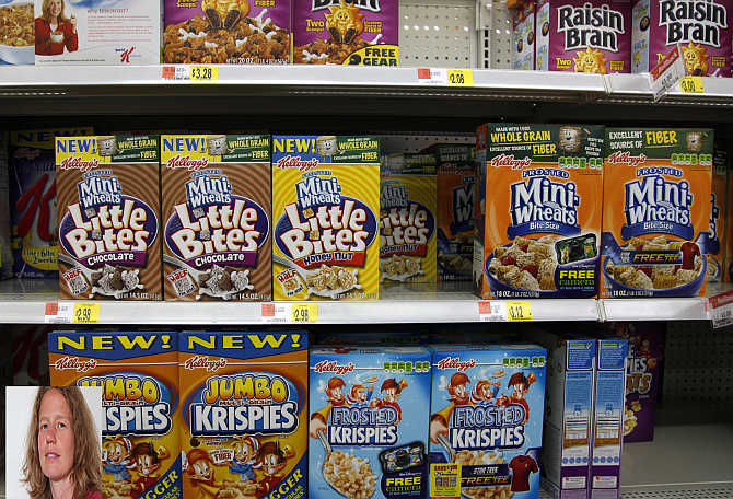 Boxes of Kellogg's cereal are displayed on a store shelf in Westminster, Colorado. Inset, Amy Padour.
