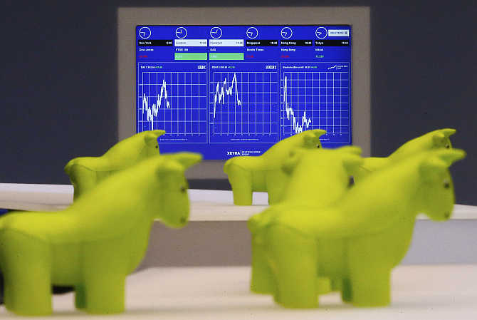 Styrofoam bull figurines are pictured in front of a monitor on the trading floor of Frankfurt's stock exchange in Germany. Photo is for representation purpose only.