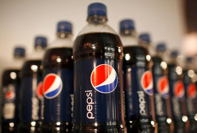 Bottles of Pepsi cola are seen in a display at PepsiCo's Investor Meeting event in New York.