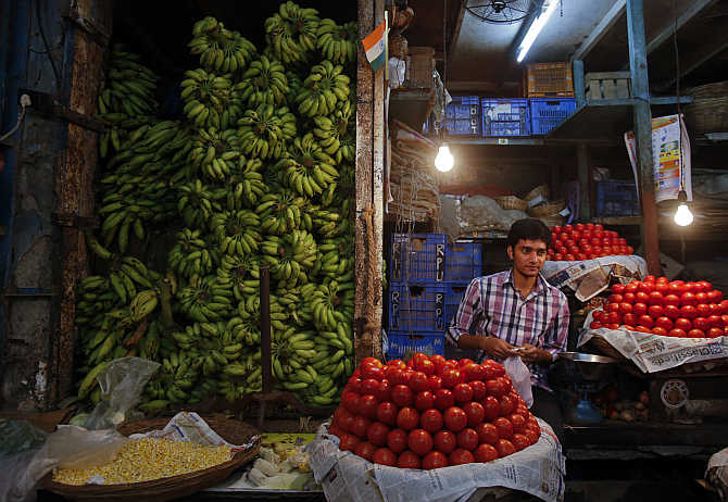 A vegetable stall at a wholesale fruit and vegetable market in Mumbai.