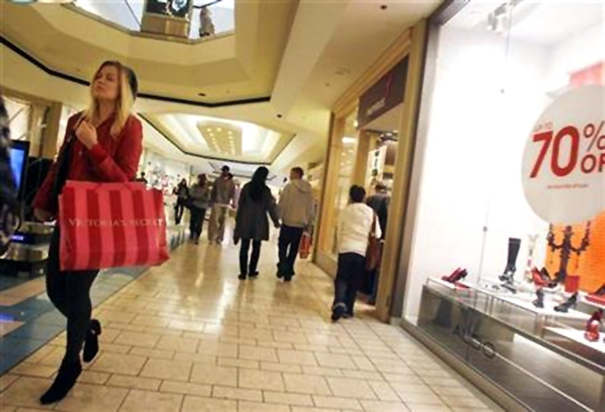 A woman walks at the Beverly Center shopping mall in Los Angeles.
