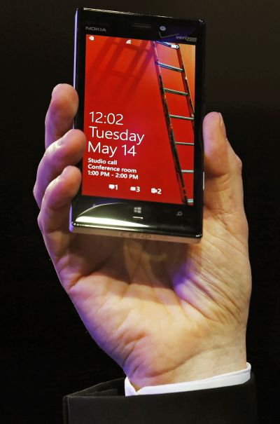 Nokia vice president for industrial design Stefan Pannenbecker holds the Nokia Lumia 925 at its launch.