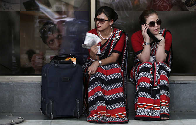 Air India air hostesses outside the domestic airport in New Delhi.