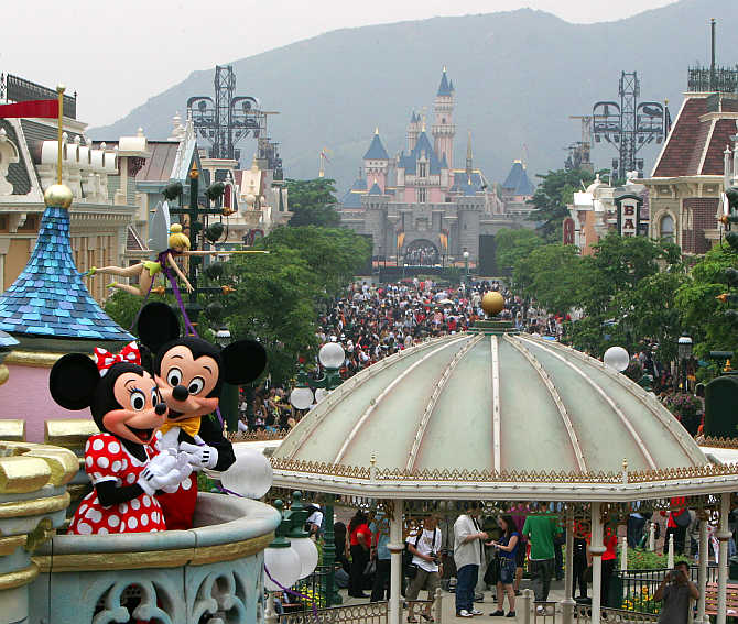 Mickey Mouse and Minnie Mouse perform at Hong Kong Disneyland.