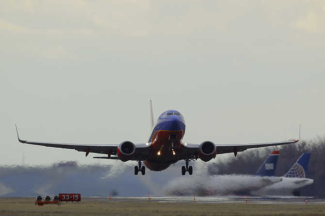 A Southwest Airlines passenger jet lifts off at Reagan National Airport in Washington.