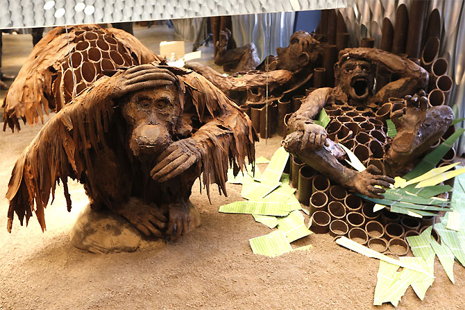 A monkey and a chimpanzee chocolate creations by French chocolate maker Patrick Roger are displayed in his shop in Paris.