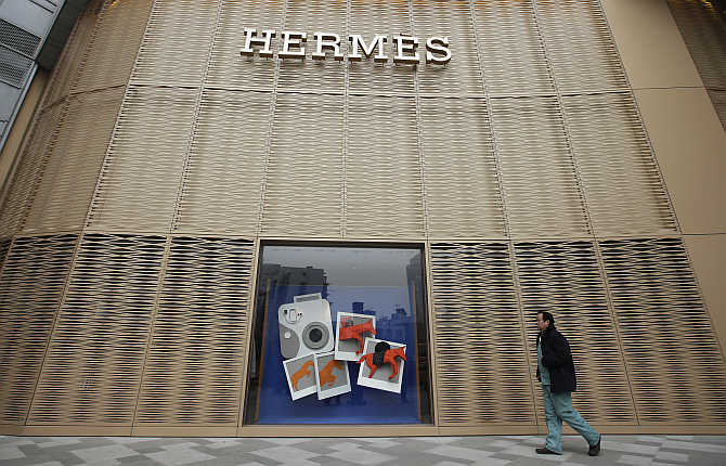A man walks past a Hermes store in Wuhan, Hubei province, China.