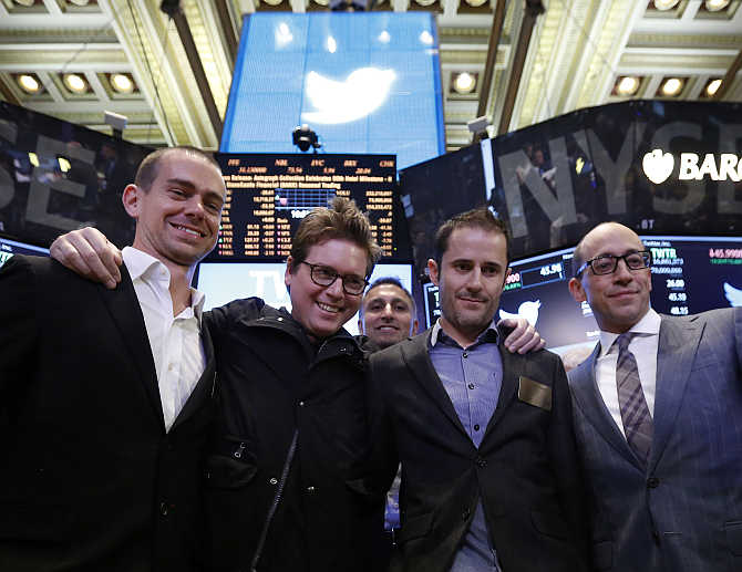 Twitter CEO Dick Costolo, right, celebrates the Twitter IPO with founders Jack Dorsey, left, Biz Stone, second left, and Evan Williams on the floor of the New York Stock Exchange.