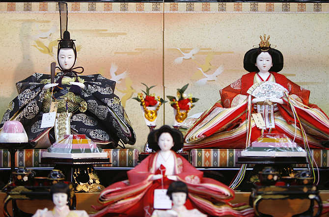 Ornamental 'hina' dolls on display at a shop in Tokyo, Japan.