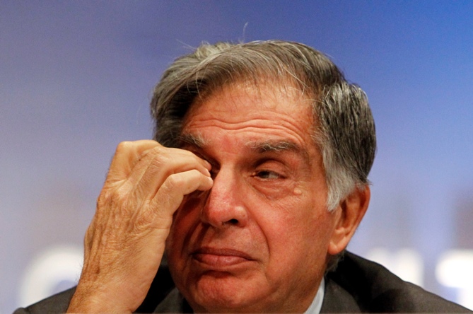 Ratan Tata wipes his eye during an annual general meeting of Tata Consultancy Services in Mumbai.