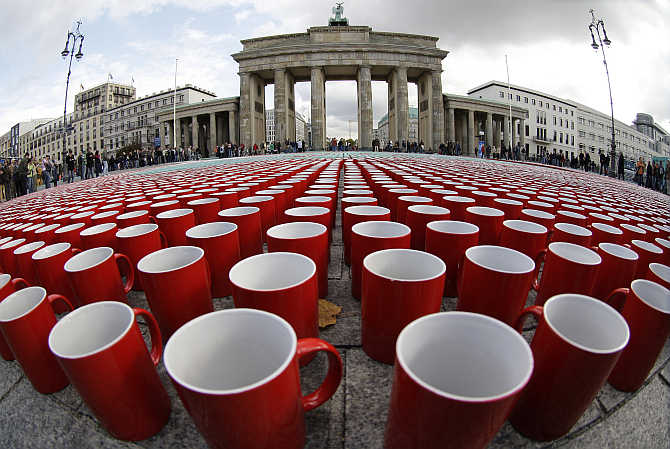 More than 77,000 coffee cups are arranged in a pattern on the ground next to the Brandenburg Gate in Berlin, as part of a promotion for a German television documentary showing what a German citizen consumes on average in his lifetime.