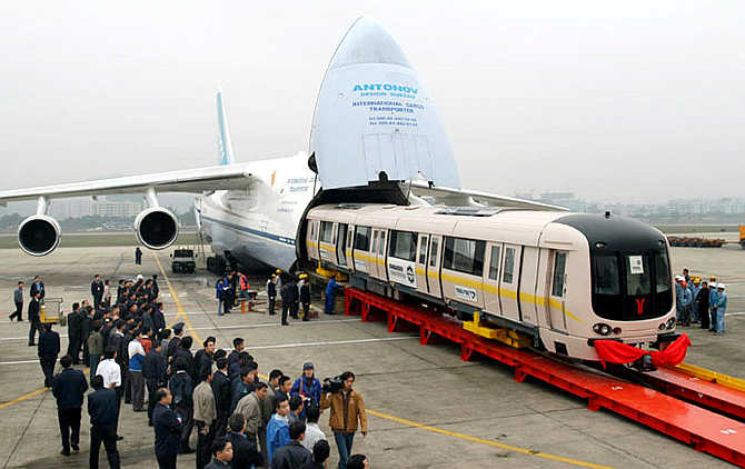 Two underground train carriages are unloaded from a cargo transport plane at Baiyuan International Airport in Guangzhou, Guangdong province, China.