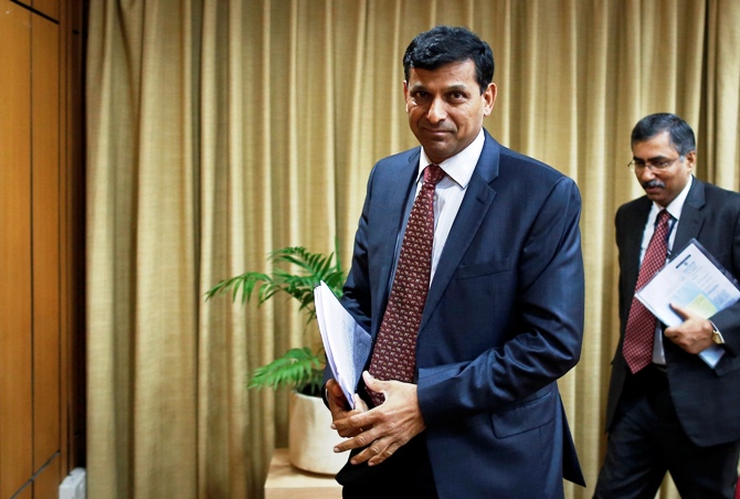 Raghuram Rajan leaves after a news conference for the mid-quarter monetary policy review at the RBI headquarters in Mumbai.