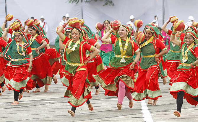 Participants perform a folk dance in Chandigarh.