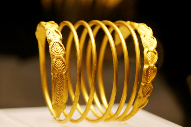 A decorated bracelet is displayed.