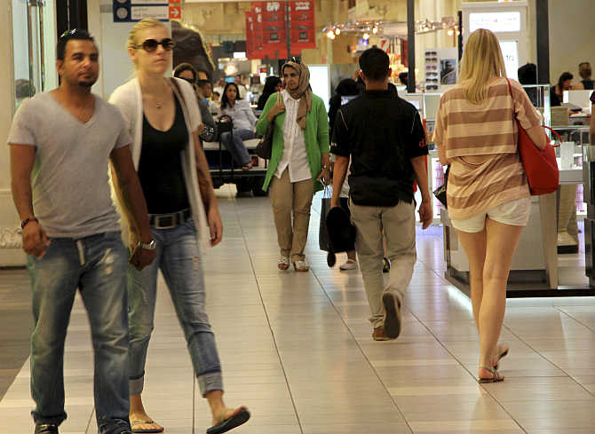 People shop in Ibn Battuta Mall in Dubai.