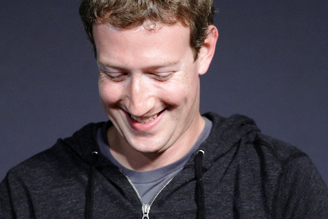 Facebook CEO Mark Zuckerberg smiles in an onstage interview for the Atlantic Magazine in Washington.