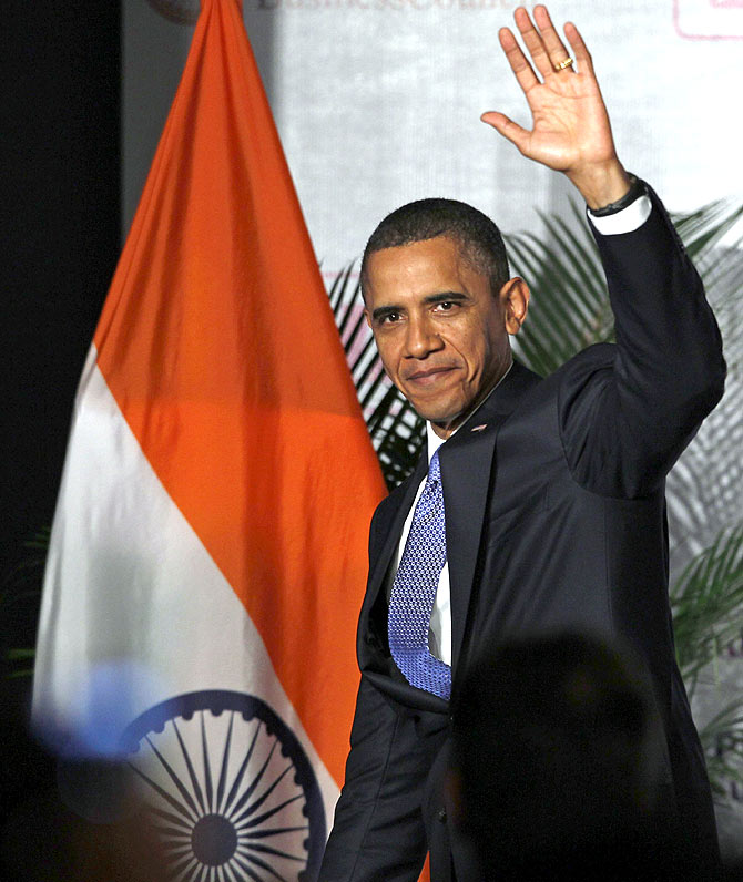 U.S. President Barack Obama waves after delivering remarks at the U.S.-India Business and Entrepreneurship Summit in Mumbai.