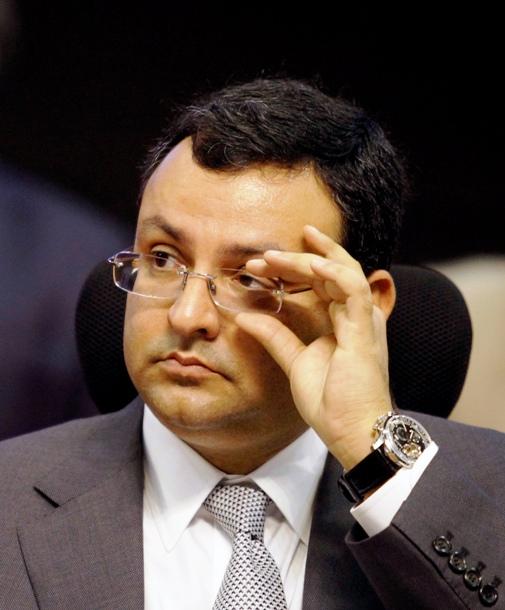 Tata Group chairman Cyrus Mistry adjusts his glasses as he attends the Vibrant Gujarat Summit at Gandhinagar.