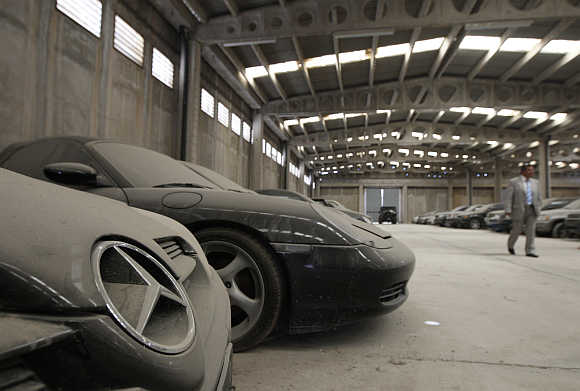 Confiscated luxury cars inside a warehouse of Oddy in Athens.