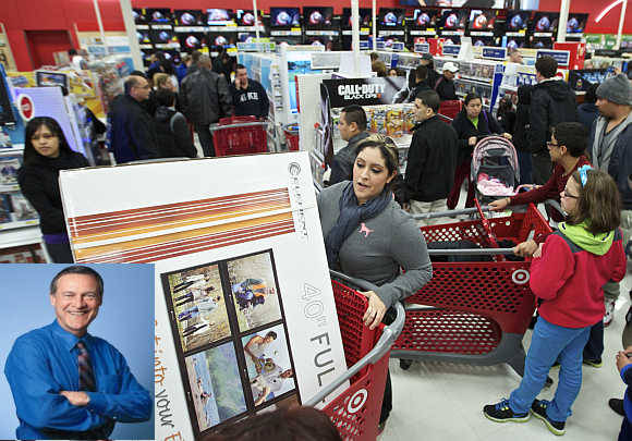 Shoppers pack a Target store in Chicago. Robert Ulrich, inset.