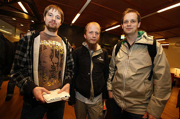 Pirate Bay co-founders Fredrik Neij, left, Gottfrid Svartholm, centre, and Peter Sunde, right, in Stockholm, Sweden.