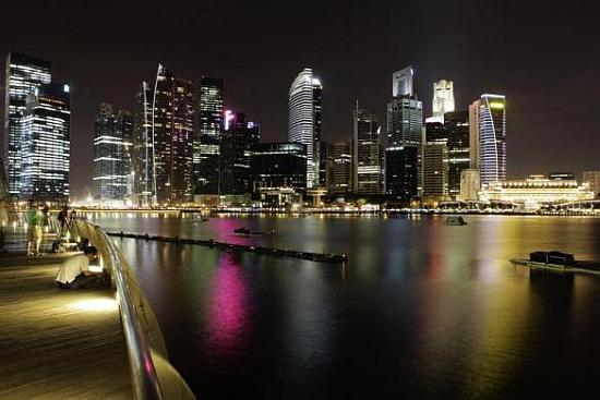 The skyscrapers of Singapore's central business district are pictured before Earth Hour.