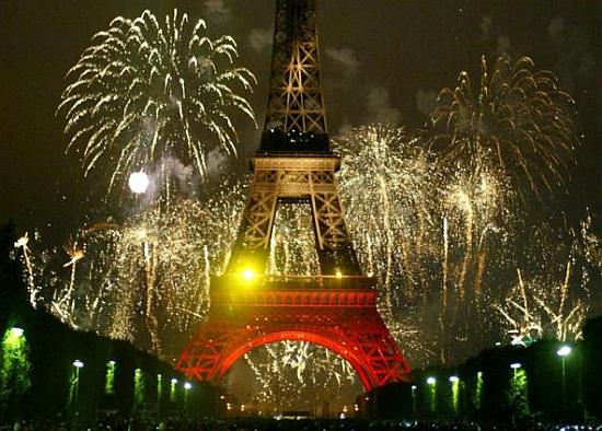 Fireworks burst over the Eiffel Tower as France celebrates Bastille Day in Paris.
