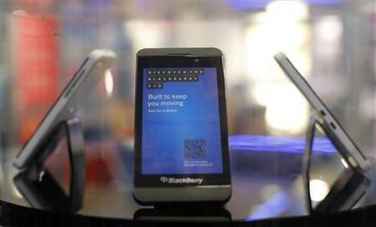 A new Blackberry Z10 is displayed at a branch of UK retailer Phones 4U in central London.