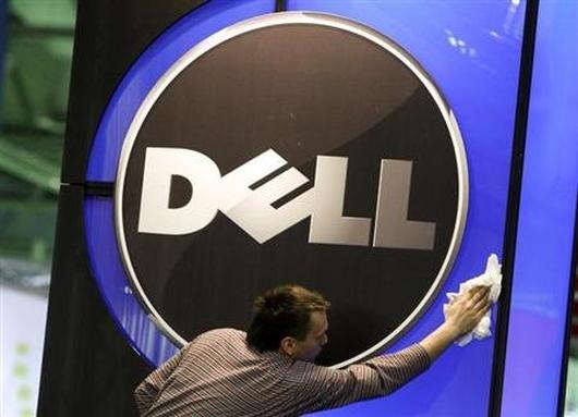 A man wipes the logo of the Dell.