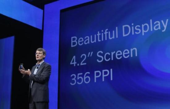 BlackBerry president and chief executive Thorsten Heins introduces a new device.