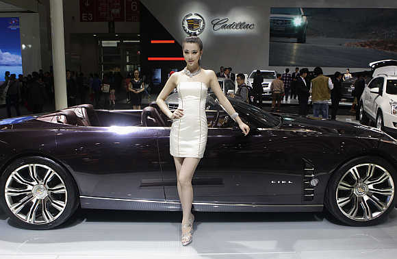 A model stands next to a Cadillac CIEL concept car in Beijing. Photo is for representation purpose only.