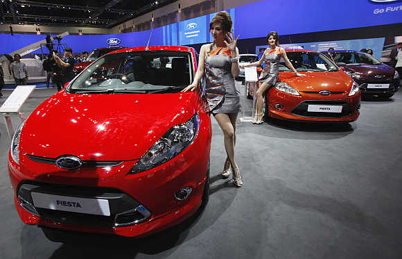 A model poses beside a Ford Fiesta in Bangkok, Thailand. Photo is for representation purpose only.
