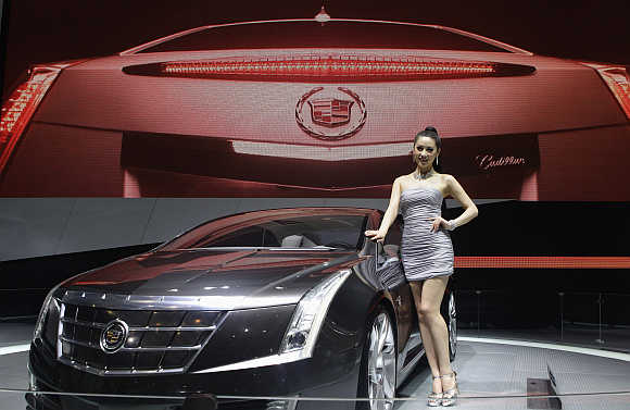 A model stands next to a Cadillac ELR in Beijing. Photo is for representation purpose only.