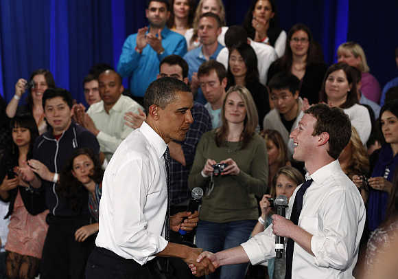 US President Barack Obama with Mark Zuckerberg in Palo Alto, California.