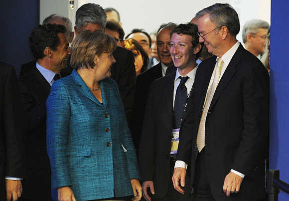 German Chancellor Angela Merkel with Mark Zuckerberg and Google CEO Eric Schmidt in Deauville, France.