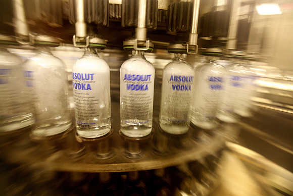 Empty bottles are washed on a production line at the Absolut bottling facility in Ahus, Sweden.