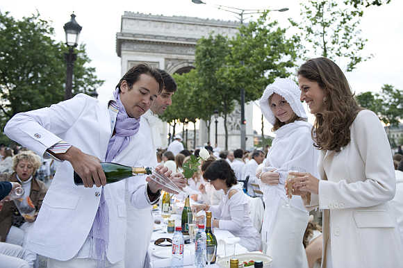 A view of the White Dinner event at the Champs Elysee near the Arc de Triomphe in Paris.
