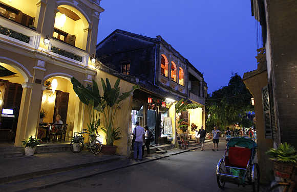 Tourists visit Vietnam's central ancient town of Hoi An, a Unesco world heritage site.