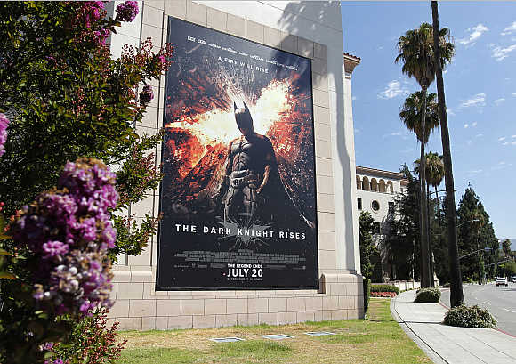 A poster for the Warner Bros. film 'The Dark Knight Rises' is displayed at Warner Bros. studios in Burbank, California.